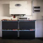 Residential home backup battery bank with hybrid inverter wiring